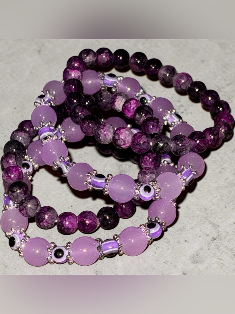 Purple Beaded Stretch Bracelet Stack with Evil Eye Accents